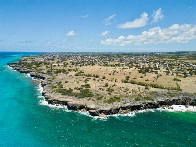 Aerial view of the 54-acre sea-front development land at Merricks, St Philip, Barbados, with rugged Atlantic coastline