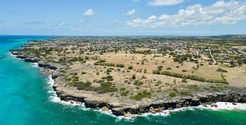 Aerial view of the 54-acre sea-front development land at Merricks, St Philip, Barbados, with rugged Atlantic coastline