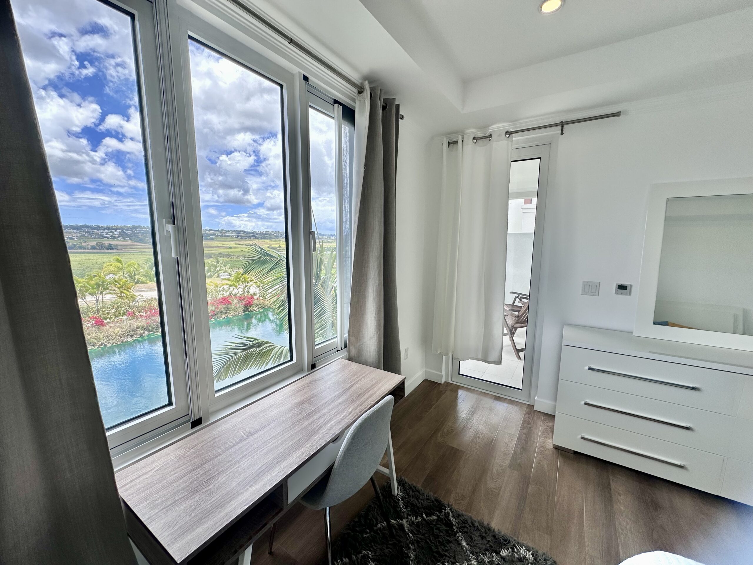 the estates at st george barbados countryside breeze highway gated development mature communal pool gym tennis paddle onyx real estate rental market development real estate