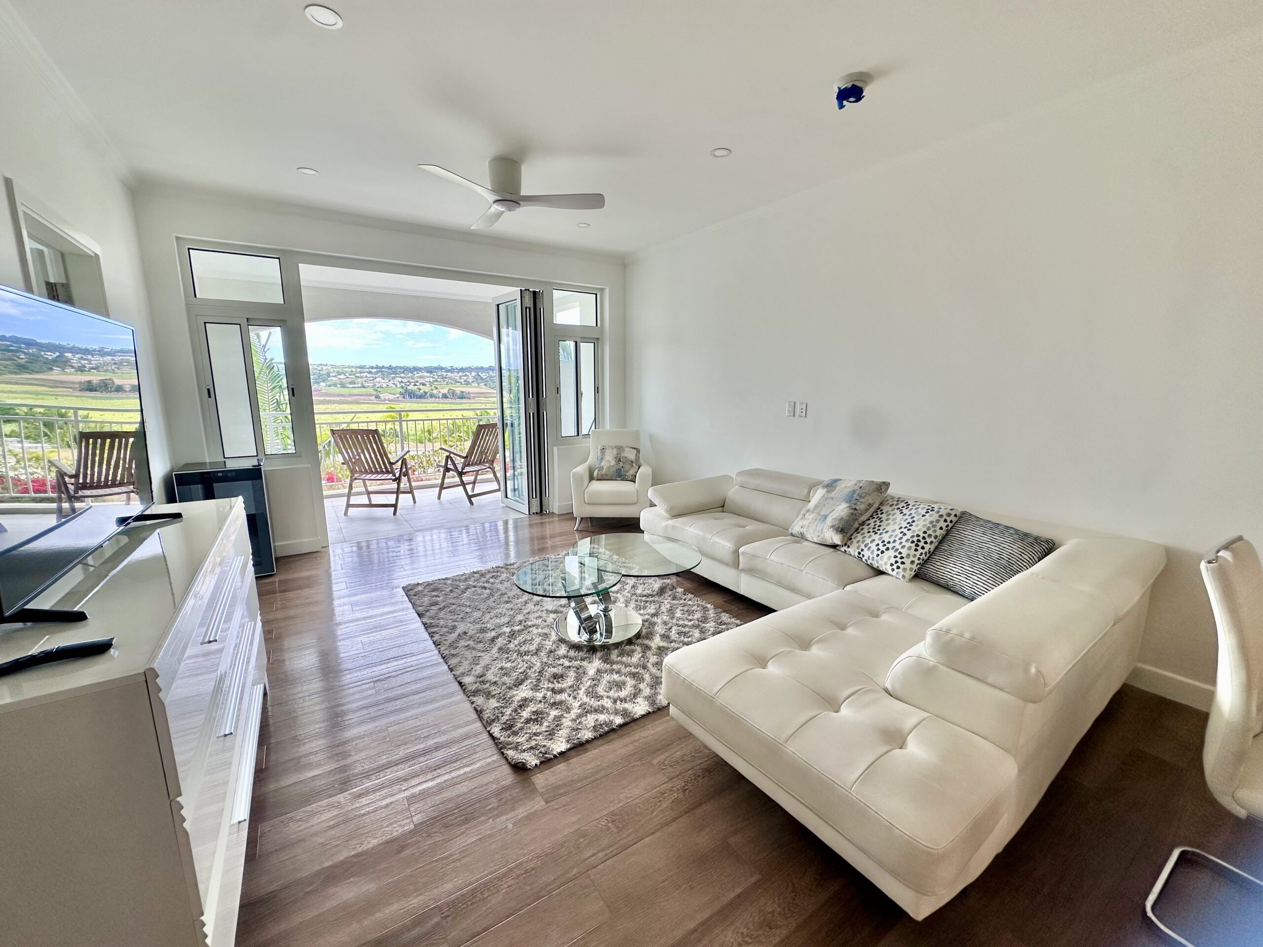 the estates at st george barbados countryside breeze highway gated development mature communal pool gym tennis paddle onyx real estate rental market development real estate