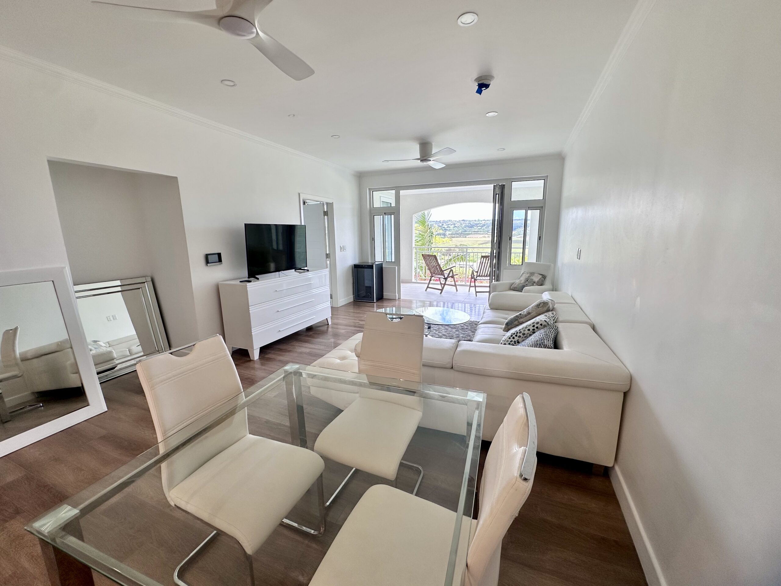 the estates at st george barbados countryside breeze highway gated development mature communal pool gym tennis paddle onyx real estate rental market development real estate