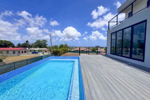 Private swimming pool and sun deck at the modern villa, Millennium Heights Lot 4