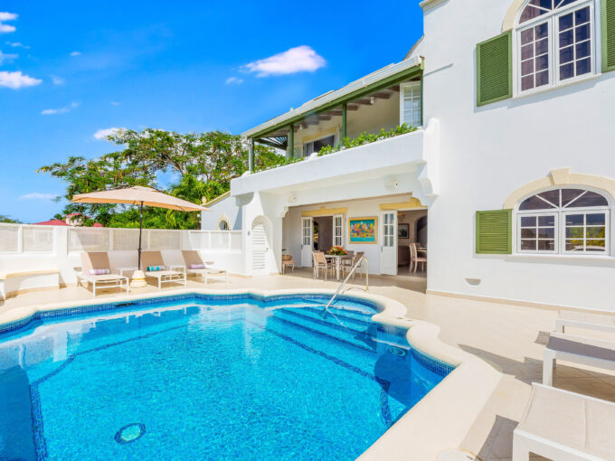 Swimming pool and villa exterior at Villa Horizon, Westport