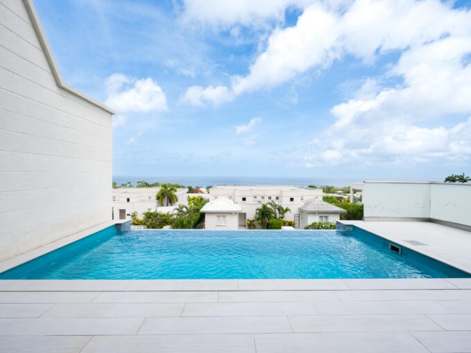 Infinity-edge pool with panoramic West Coast sea views at Westmoreland Hills 46, St James, Barbados