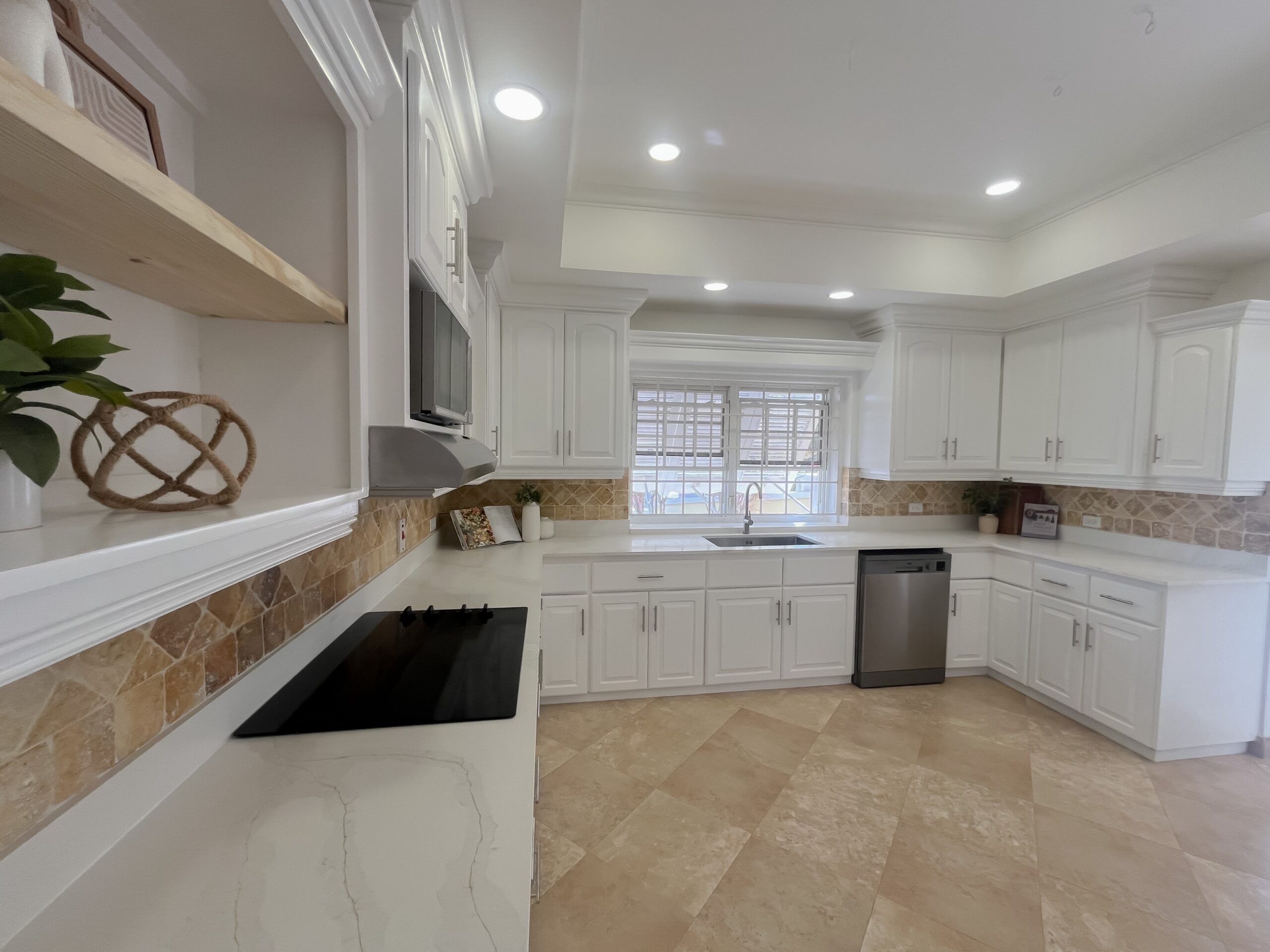 Upgraded kitchen with quartz countertops and stainless steel appliances at Looking Glass, Durants, Christ Church