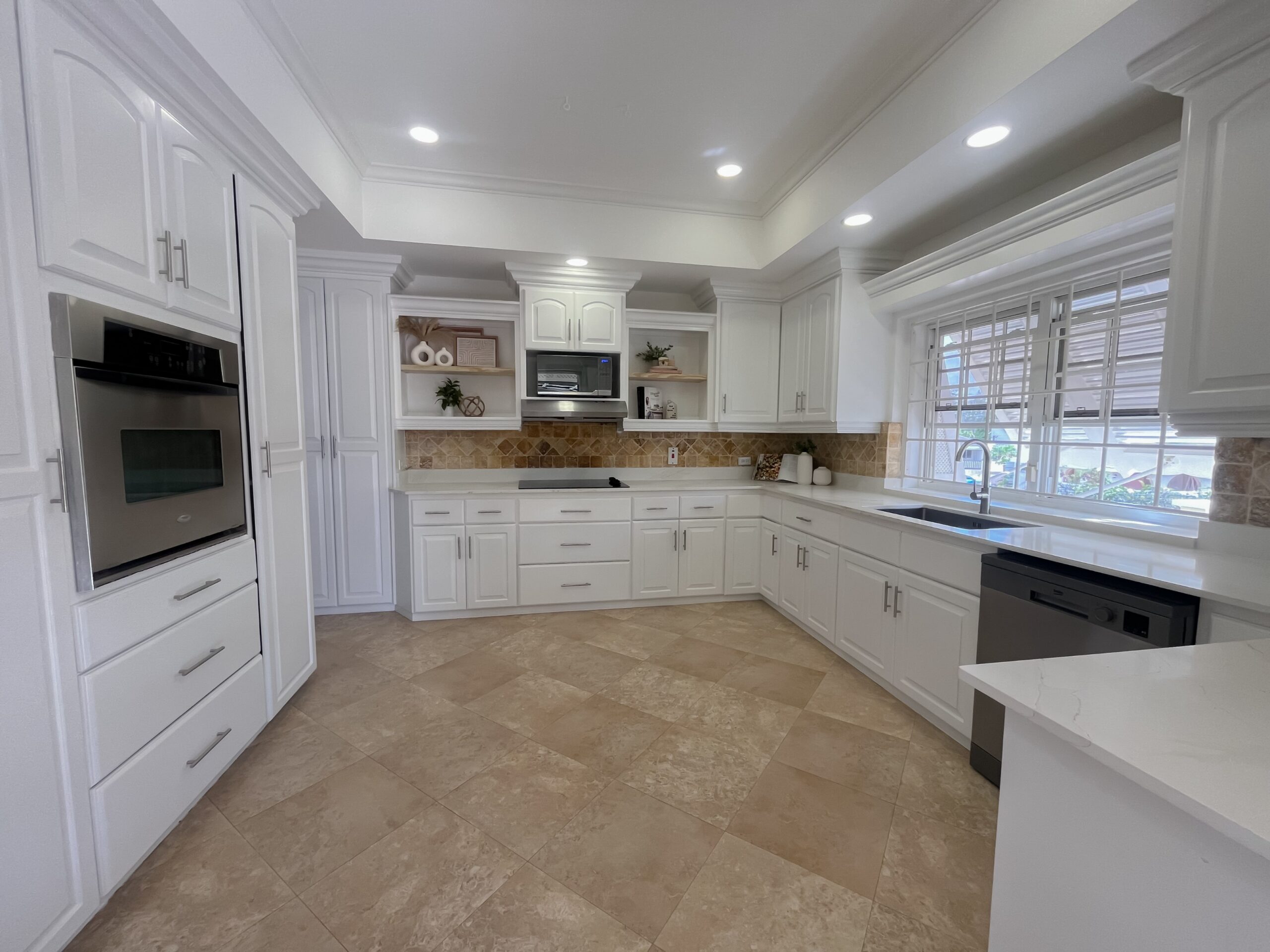 Upgraded kitchen with quartz countertops and stainless steel appliances at Looking Glass, Durants, Christ Church