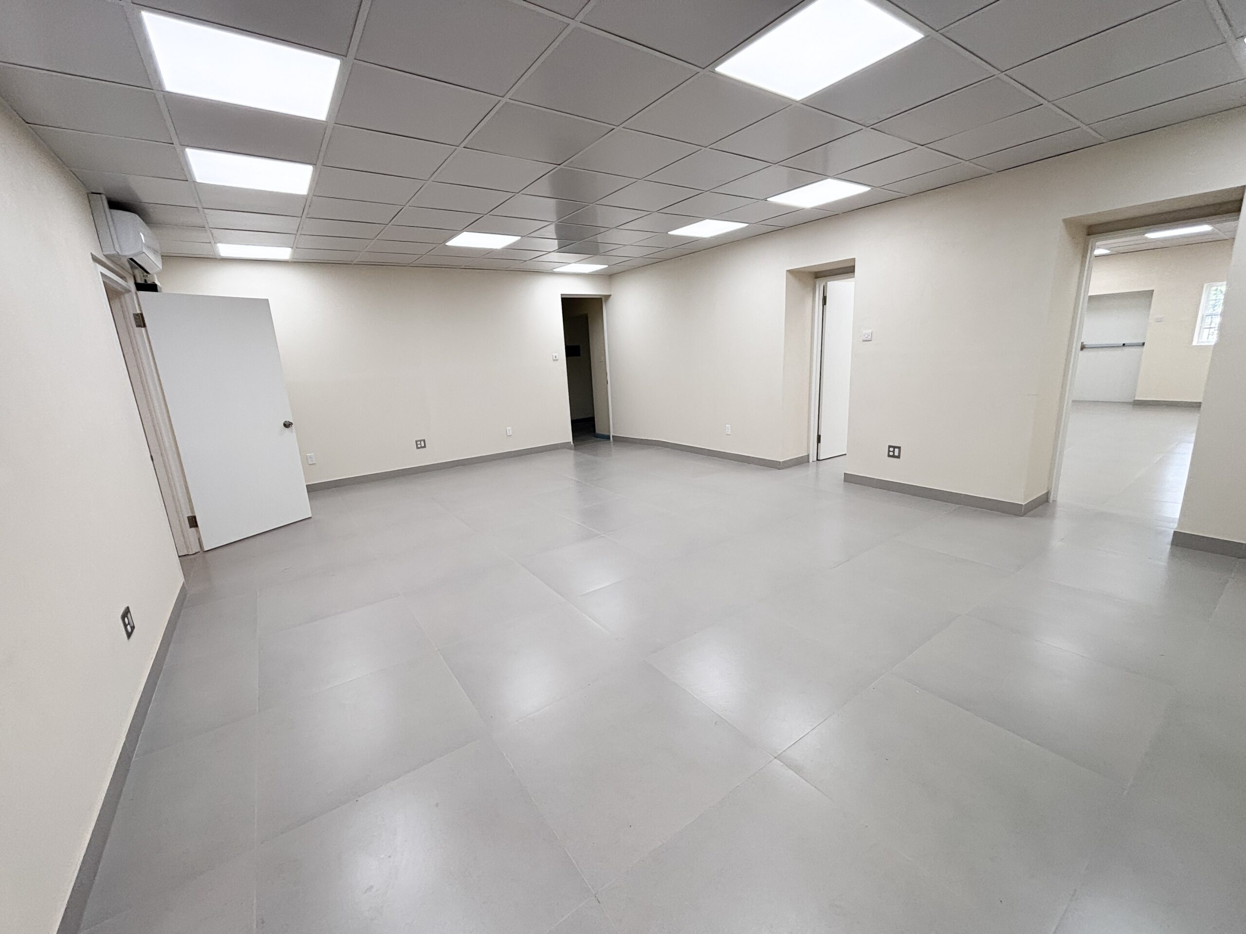 Main consultation room viewed from the bathroom at Pine Medical Centre Suite 2, Belleville, St Michael