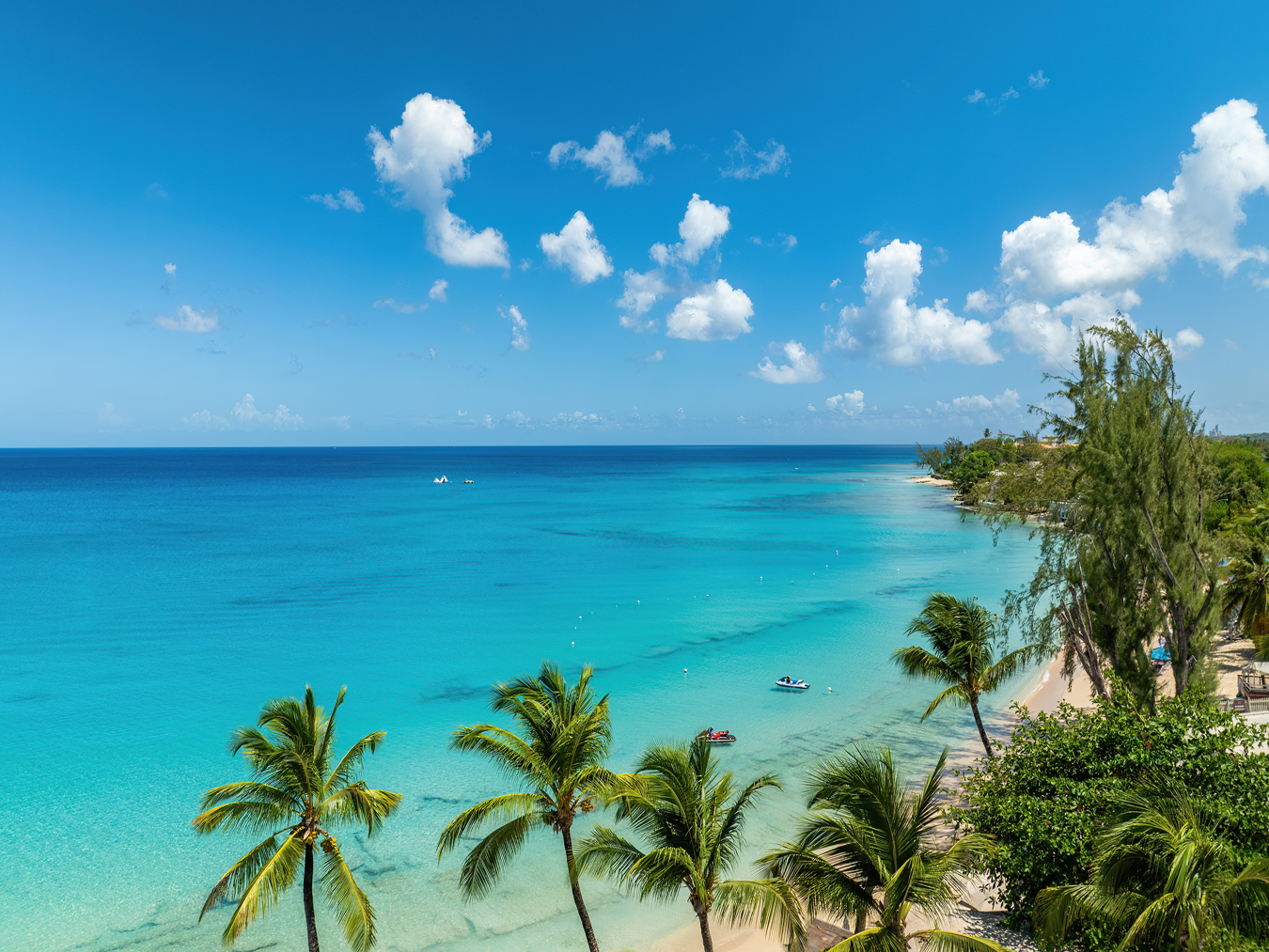 Turquoise sea and beach at Mullins Bay beside Beyond, St Peter