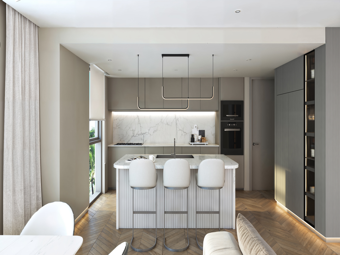Contemporary kitchen with island and bar seating at Beyond, Mullins Bay, St Peter