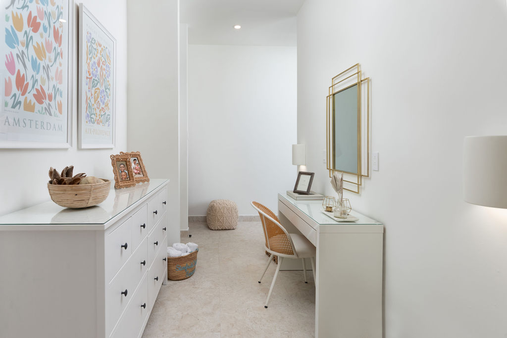 Dressing area with vanity and drawers at Calico, a beachfront villa in St James, Barbados