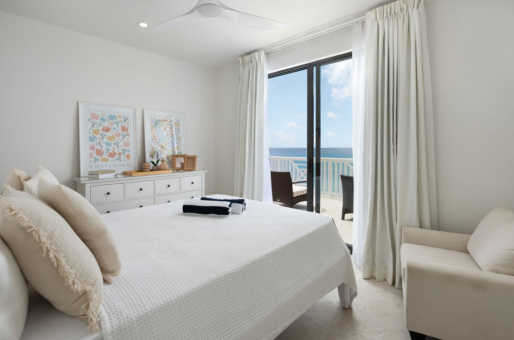 Bedroom with sea views at Calico, a beachfront villa in St James, Barbados