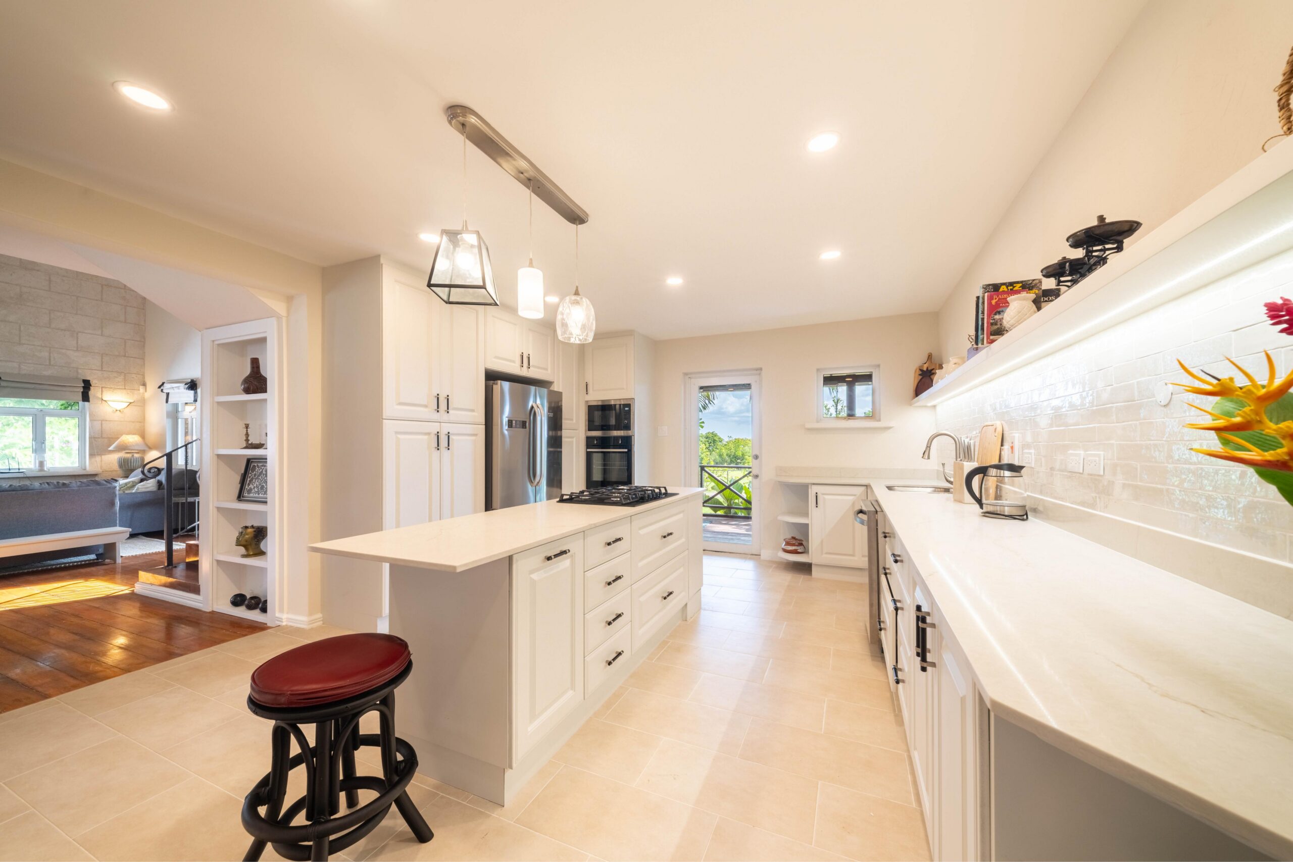 Kitchen with island and bar seating at 39 Blowers, St James