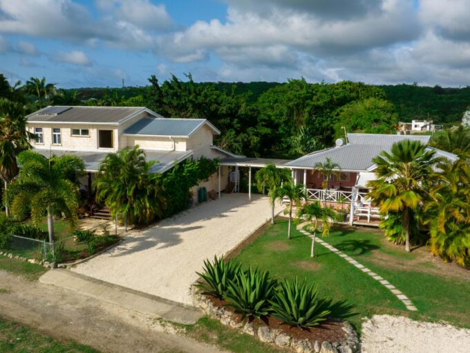 Aerial view of the main house and gardens at 39 Blowers, St James