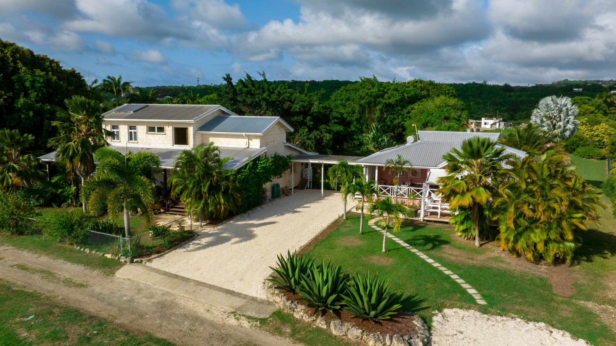 Aerial view of the main house and gardens at 39 Blowers, St James