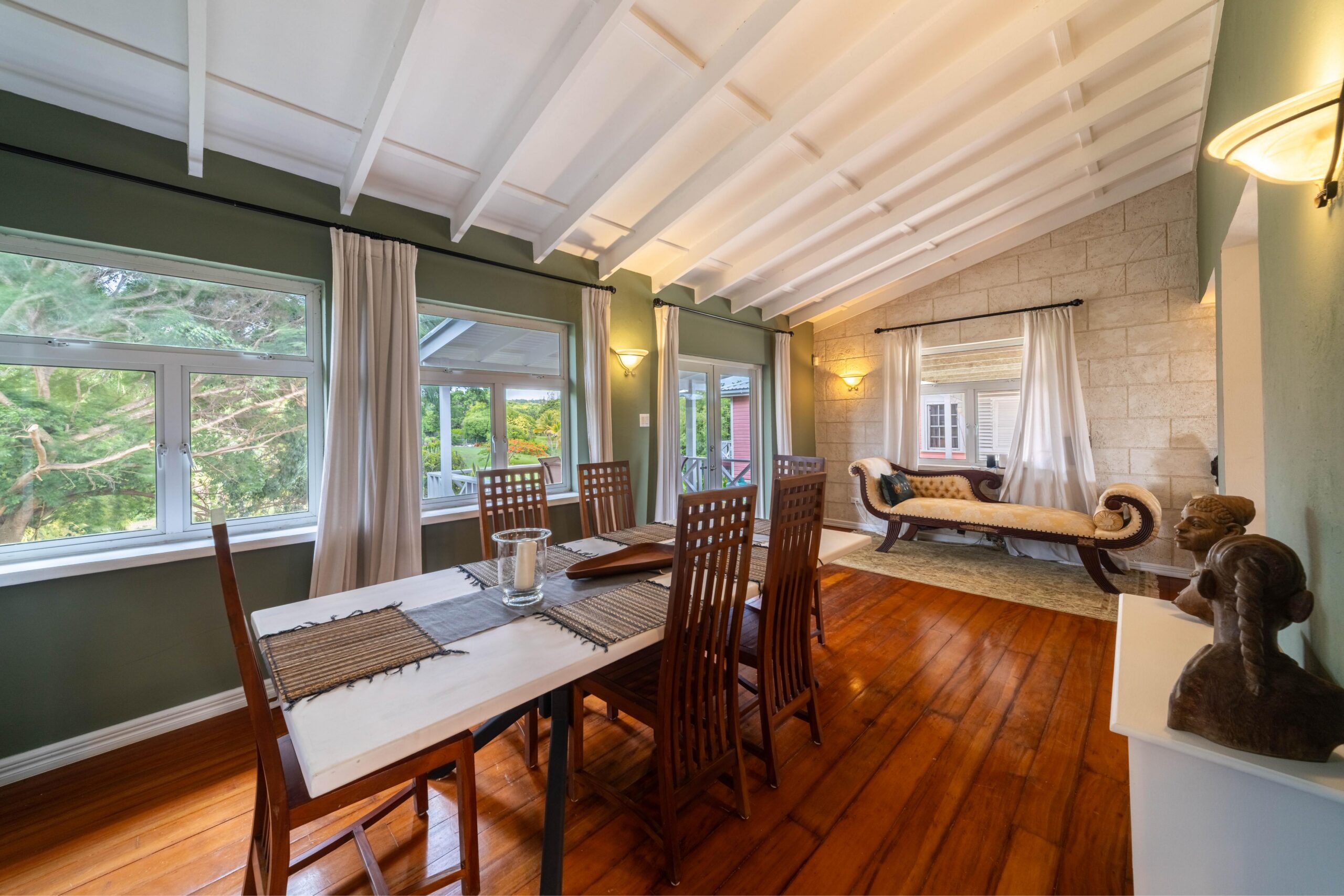 Open-plan living and dining with a vaulted ceiling at 39 Blowers, St James