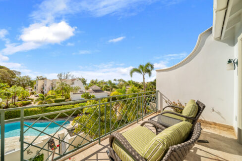 Upstairs patio with garden and sea views at Jus Chillin, Mullins Bay, St Peter