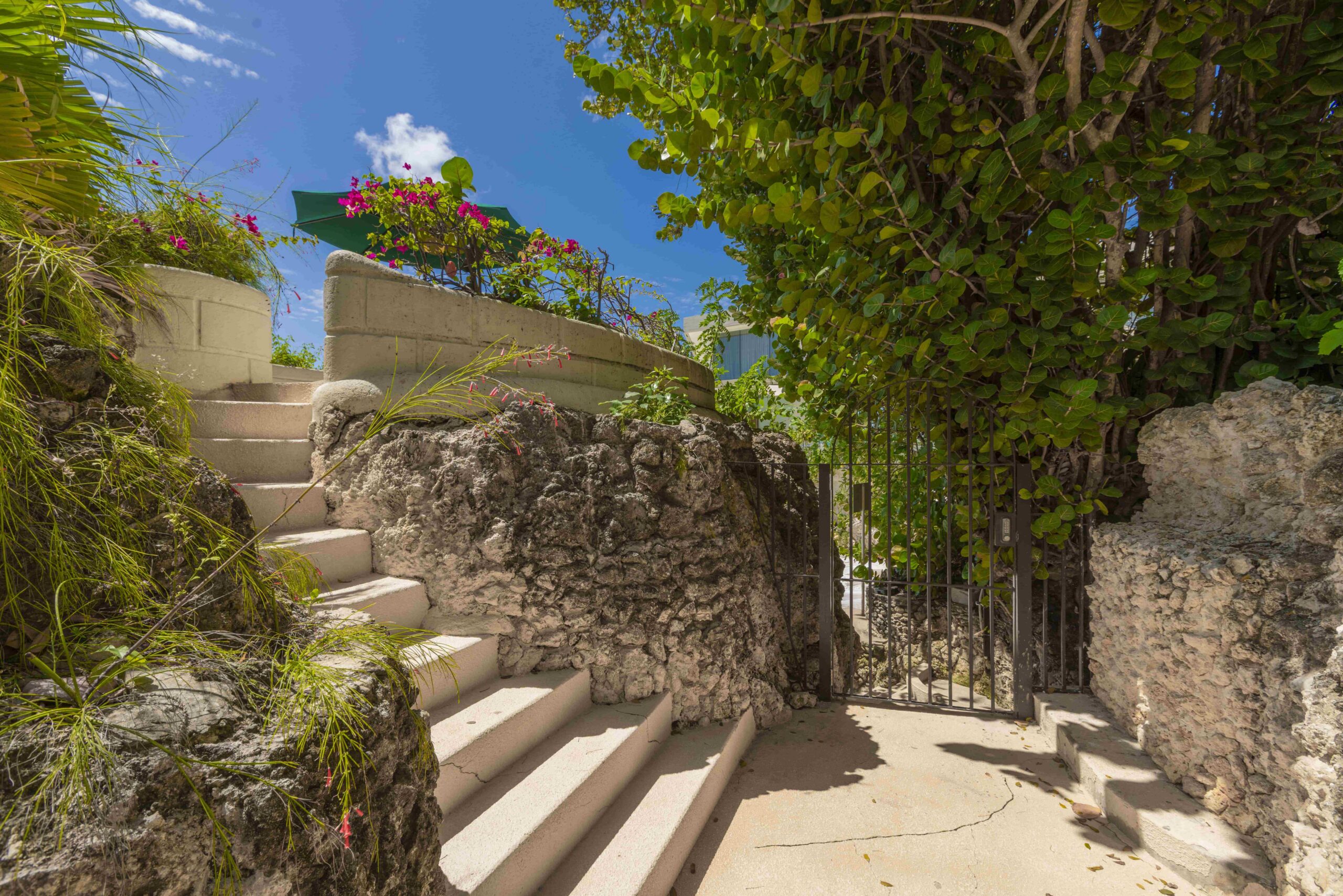 Coral stone steps down to the beach at Sandy Cove at Sandy Cove 201, St James