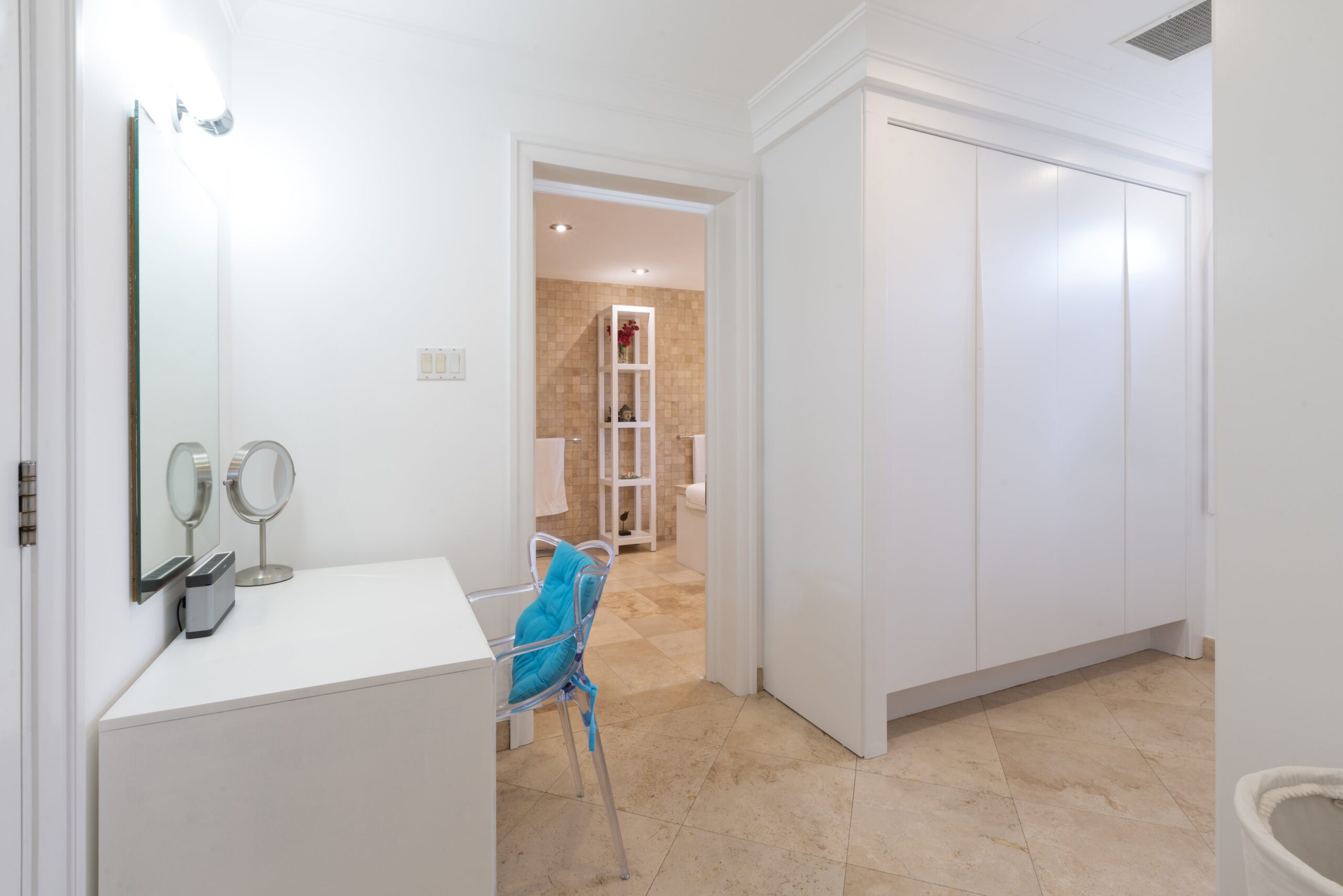 Dressing room with fitted storage at Sandy Cove 201, St James