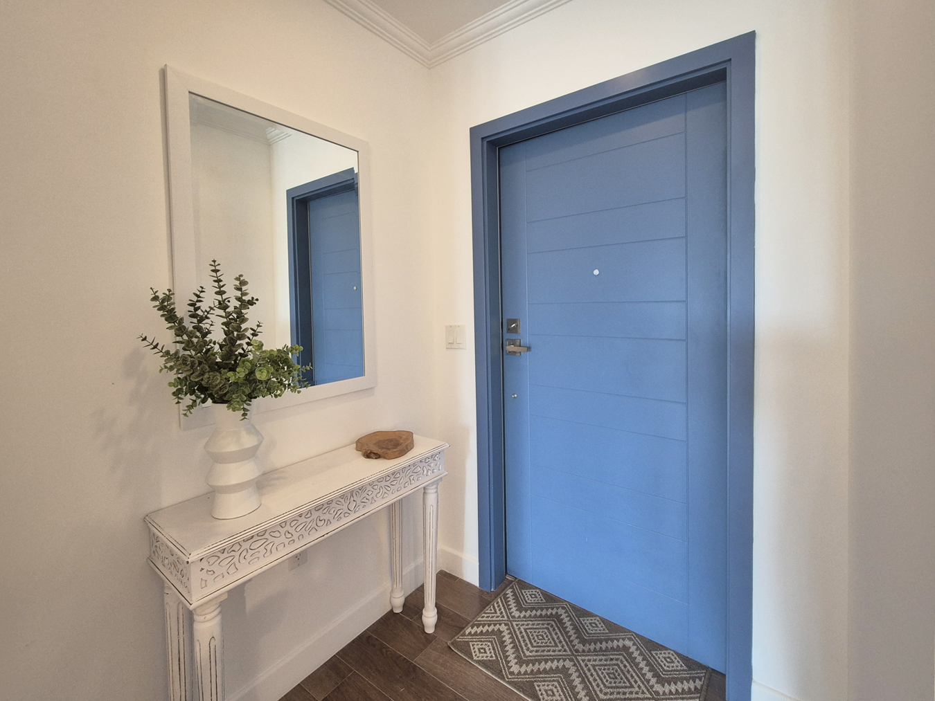 Entrance with a blue front door at The Estates at St. George M102, St George