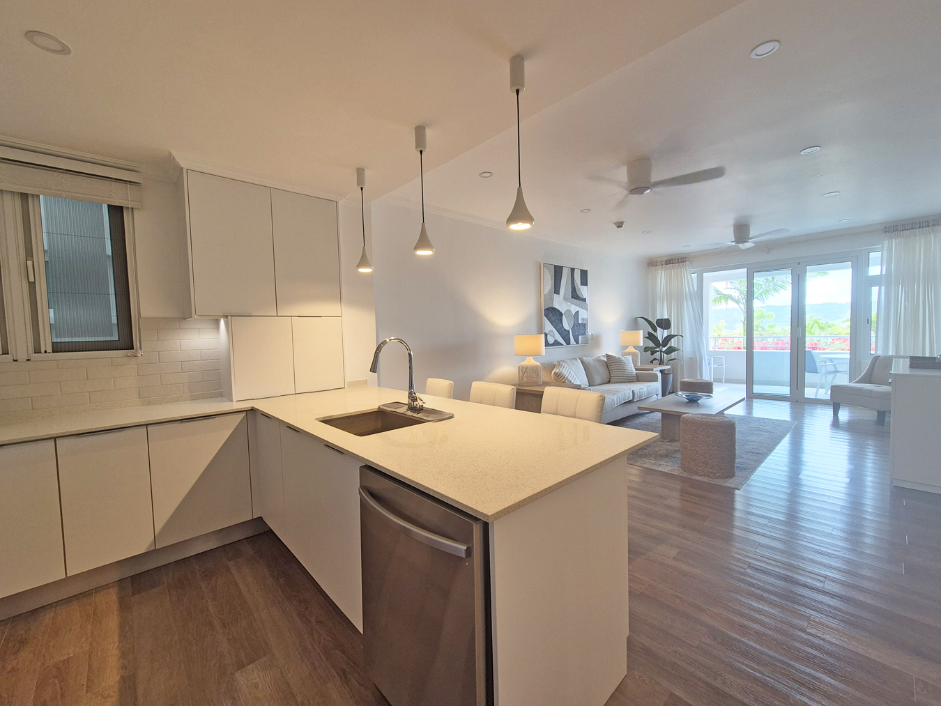 Kitchen with island opening to the living area at The Estates at St. George M102, St George