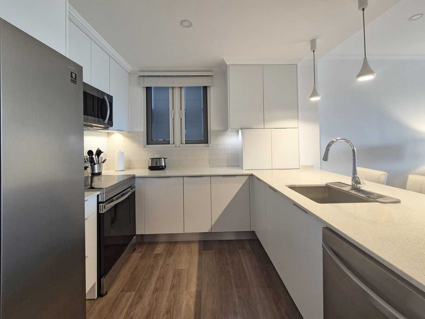 Kitchen with contemporary appliances at The Estates at St. George M102, St George