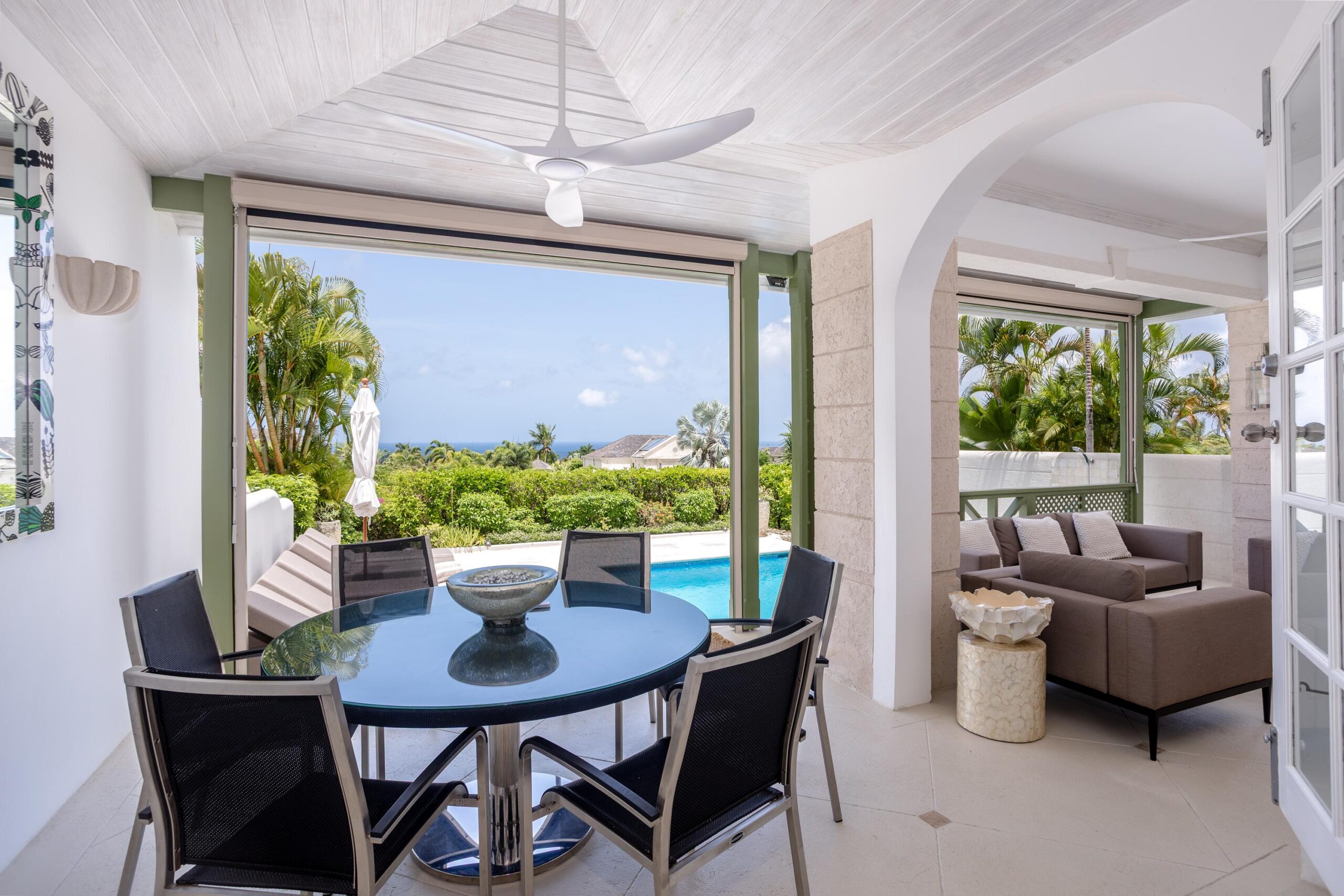 Open-plan dining and living area with sea views at Escape 2 Tamarind Row, Sugar Hill