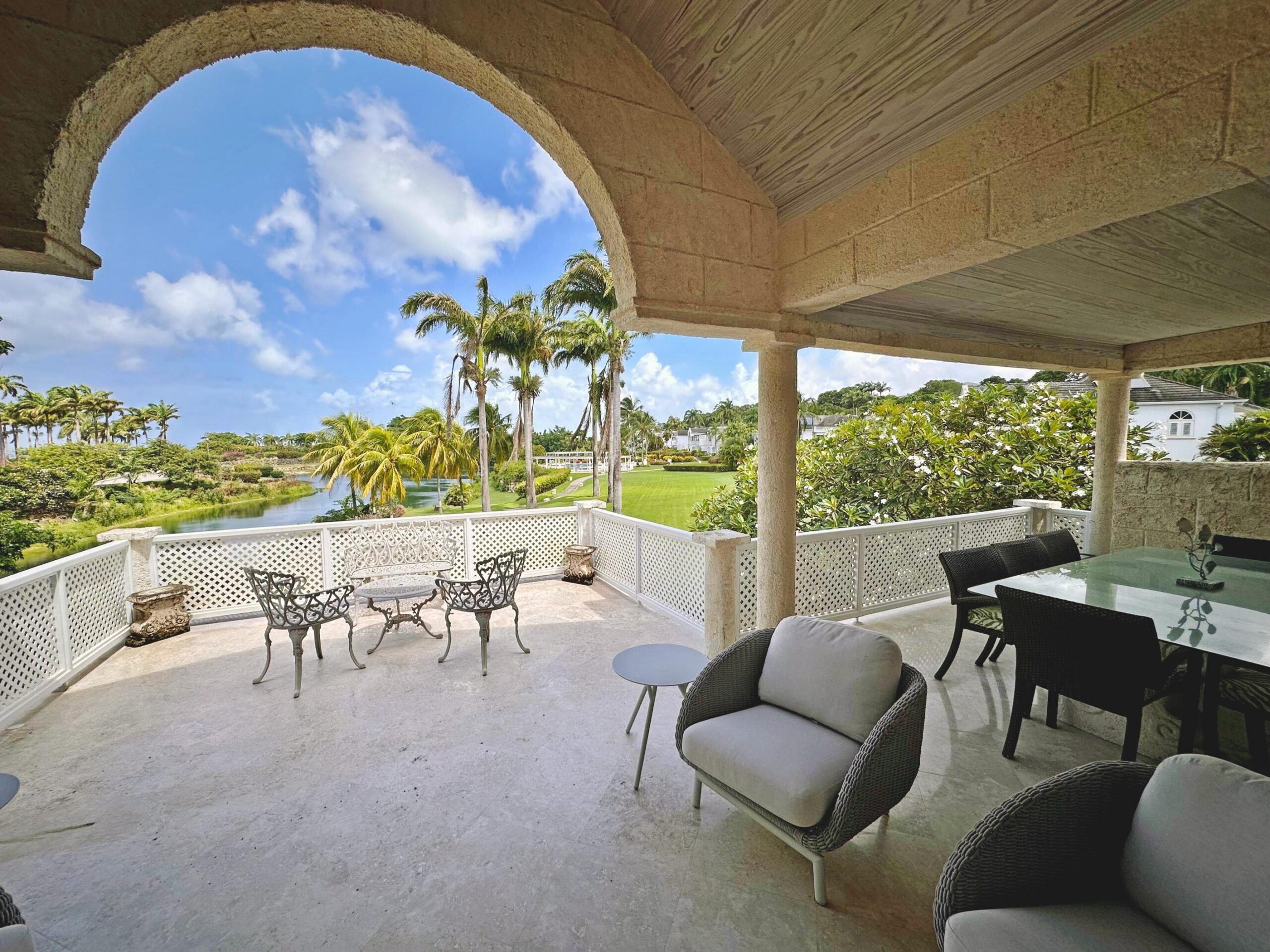 Covered terrace dining with views over Royal Westmoreland at Forest Hills 6
