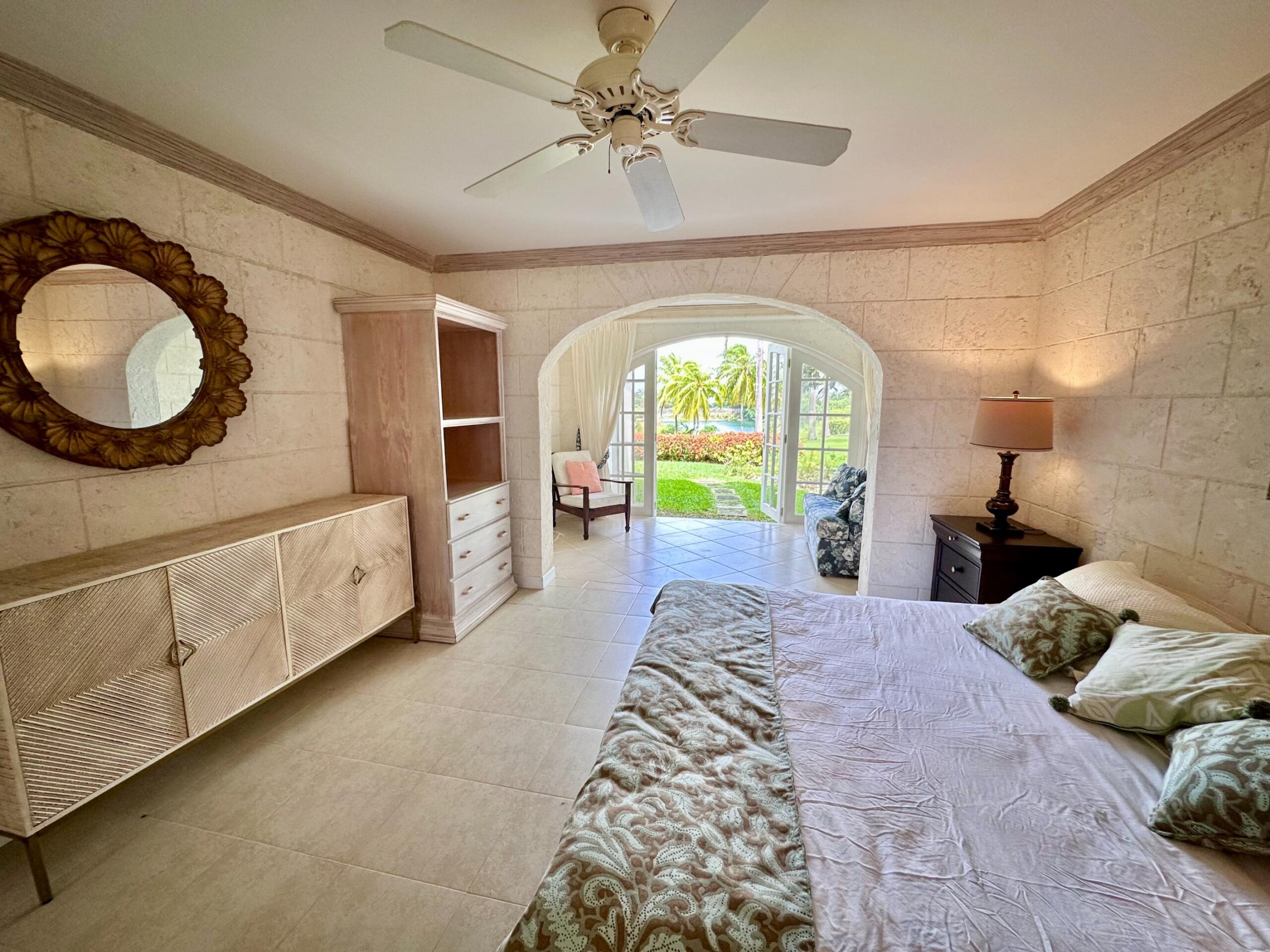 Bedroom with fitted storage and garden access at Forest Hills 6, St. James