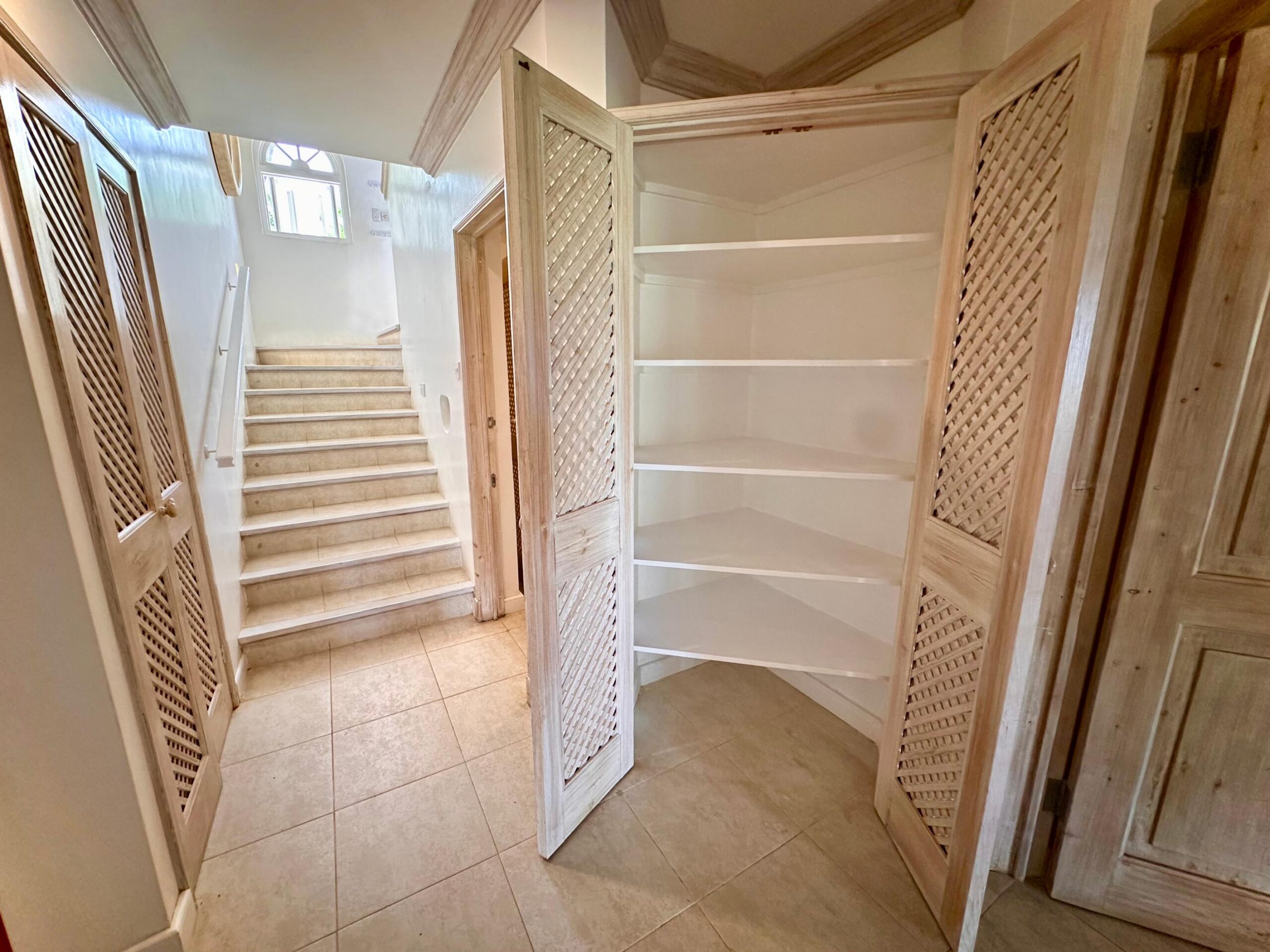 Interior staircase at Forest Hills 6 villa, Royal Westmoreland, St. James